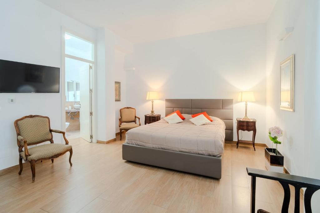 Postel nebo postele na pokoji v ubytování B&B Charme