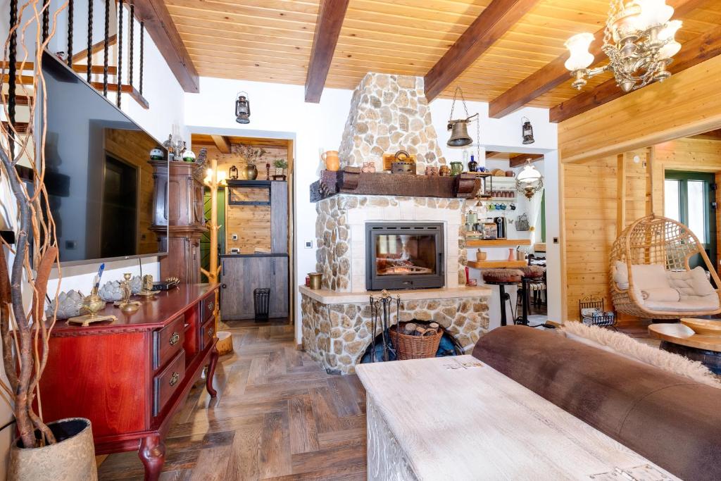 Posedenie v ubytovaní Kuća za odmor uz rijeku Slapnica, u Parku prirode Žumberak, finska sauna i jacuzzi