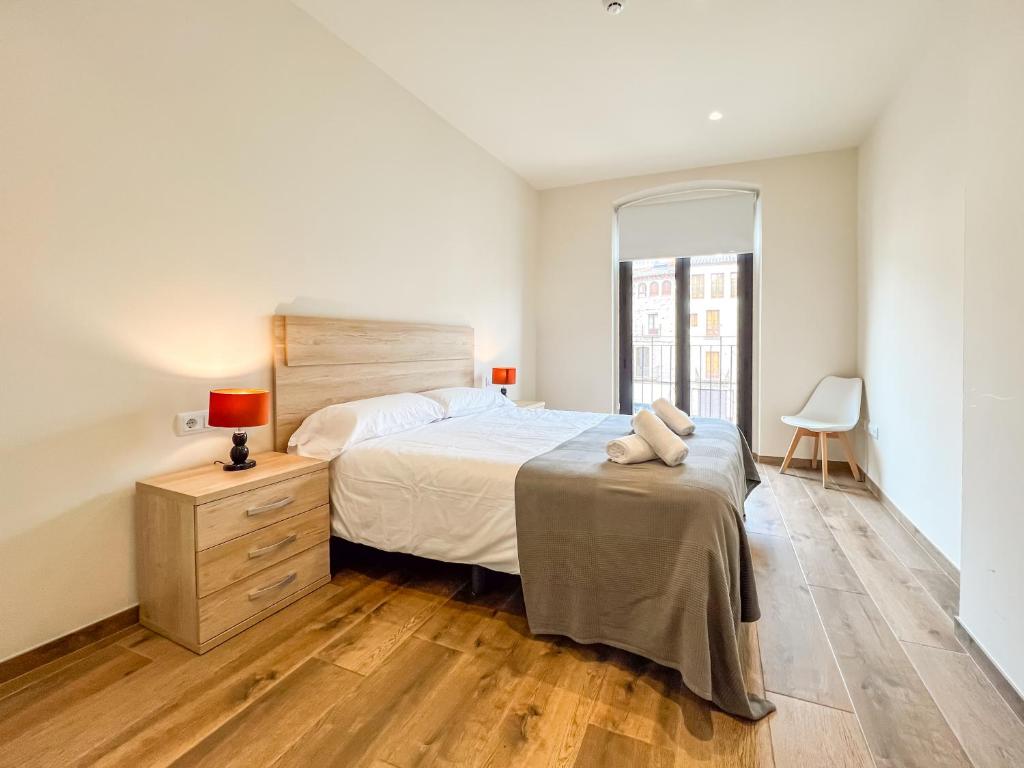 Posteľ alebo postele v izbe v ubytovaní Can Cintet 1- Apartamento en la plaza de Besalú