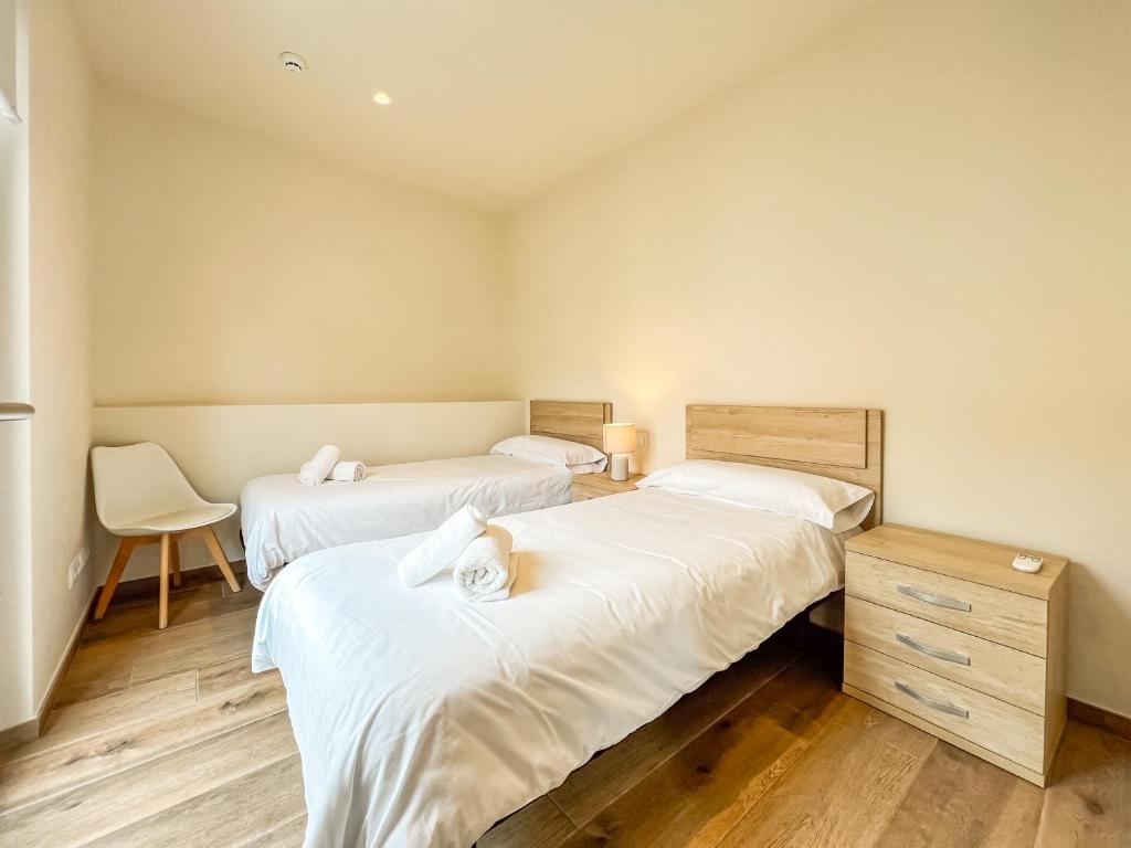 Posteľ alebo postele v izbe v ubytovaní Can Cintet 1- Apartamento en la plaza de Besalú