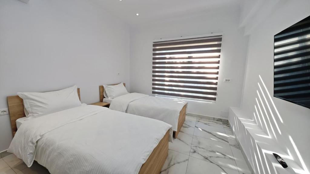 Postel nebo postele na pokoji v ubytování Villa Manuel