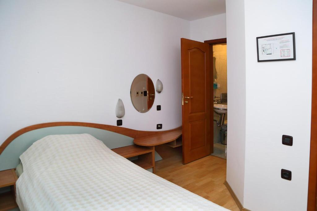 Postel nebo postele na pokoji v ubytování Gurko Hotel