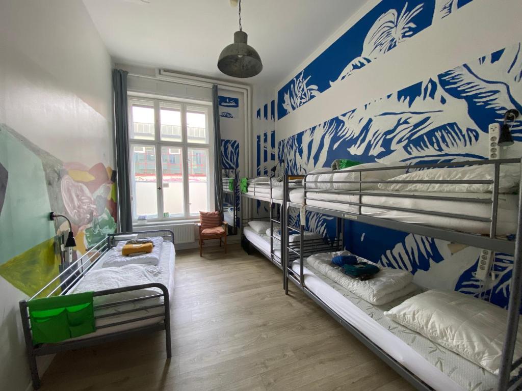 Postel nebo postele na pokoji v ubytování Kiez Hostel Berlin