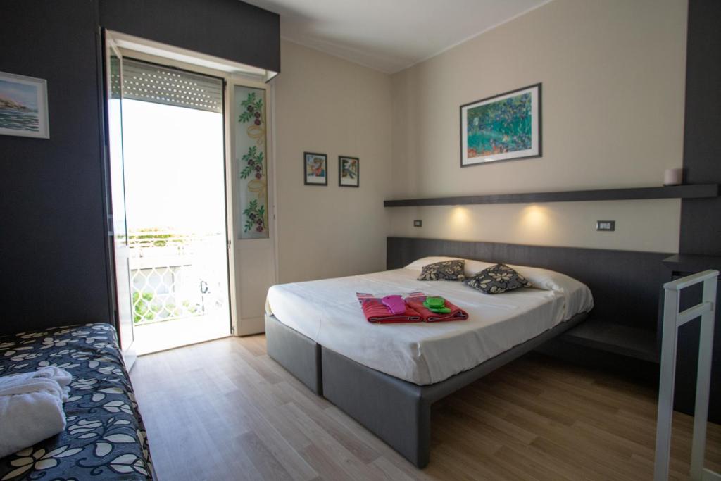 Postel nebo postele na pokoji v ubytování Hotel Imperiale & SPA