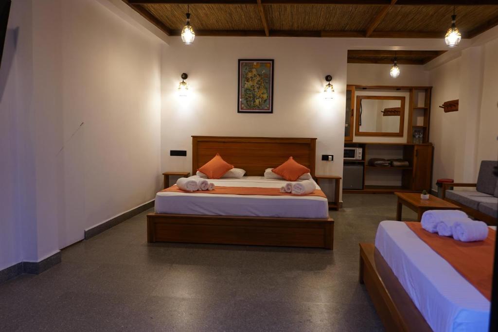Postel nebo postele na pokoji v ubytování Ollie resort