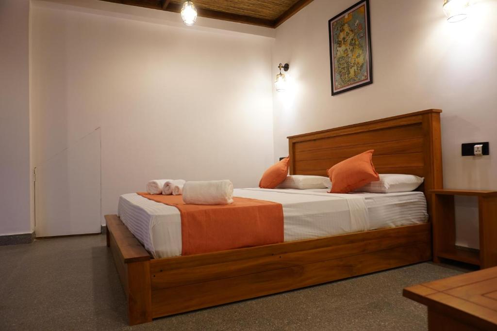 Postel nebo postele na pokoji v ubytování Ollie resort