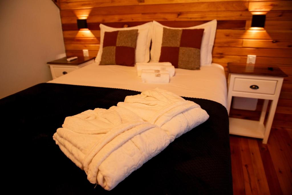 Postel nebo postele na pokoji v ubytování Cabana Água - Cabanas Recanto do Lago