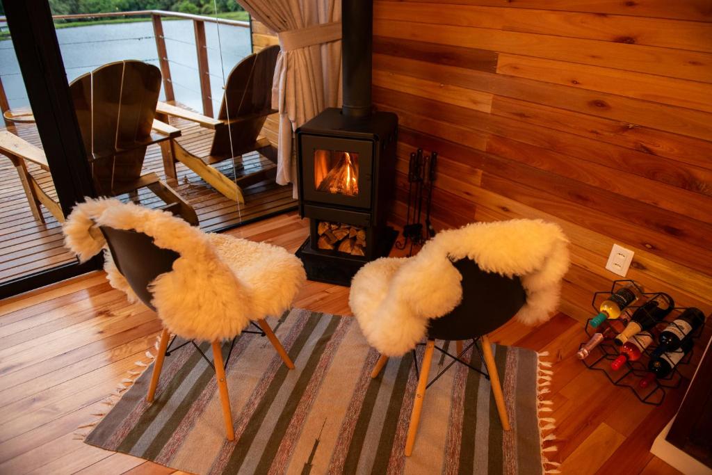 Posezení v ubytování Cabana Água - Cabanas Recanto do Lago