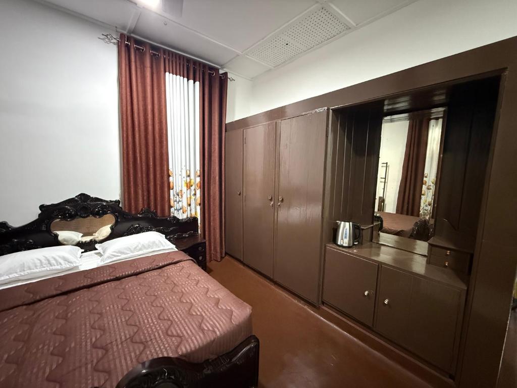 Postel nebo postele na pokoji v ubytování Bungalows by CPC