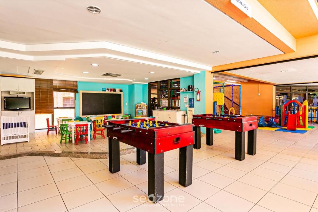 TV a/nebo společenská místnost v ubytování Resort pé na areia - Suítes JBVTOP