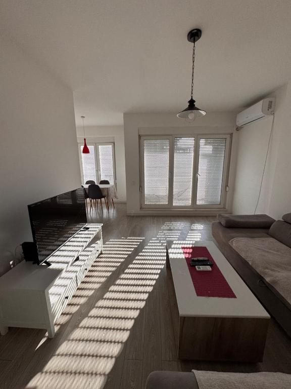 Posezení v ubytování DL Apartment