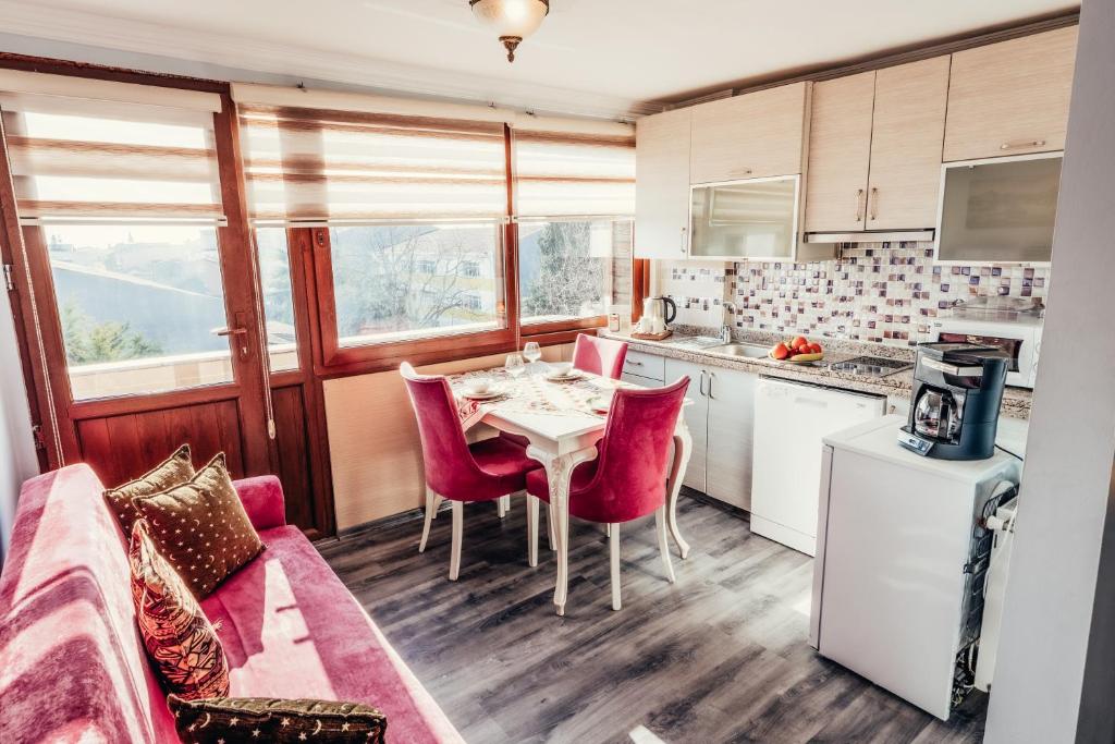 Kuchyň nebo kuchyňský kout v ubytování Olive Garden Apart