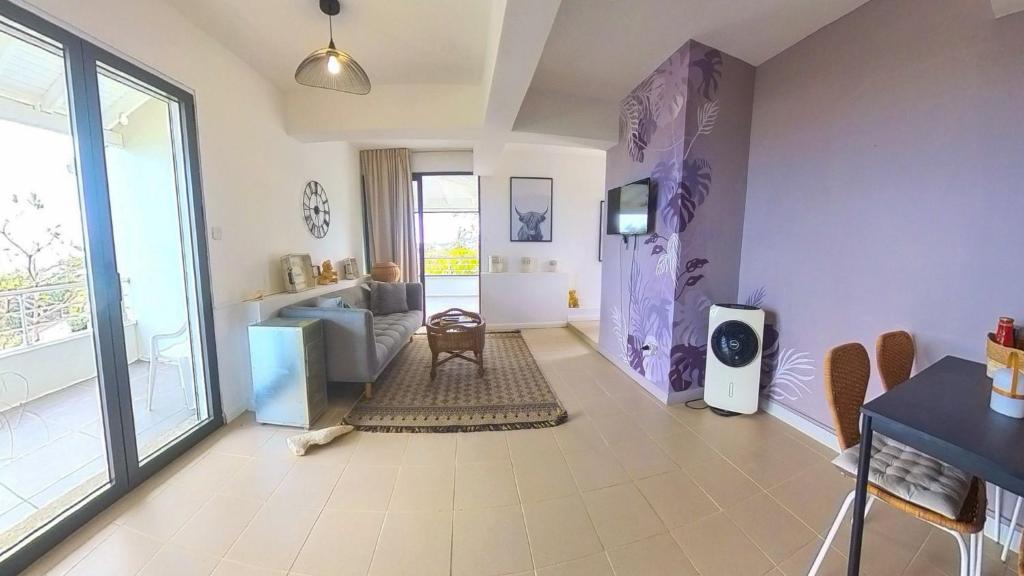 Posezení v ubytování VILLA MAGIC - stunning ocean view, pool & Starlink internet