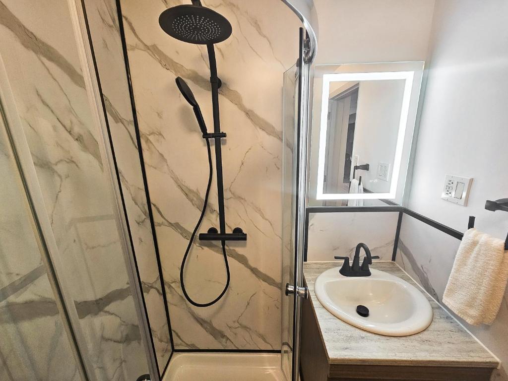 Koupelna v ubytování Hotel Le Voyageur