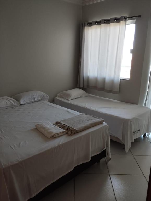 Postel nebo postele na pokoji v ubytování Hotel Algaroba Anexo