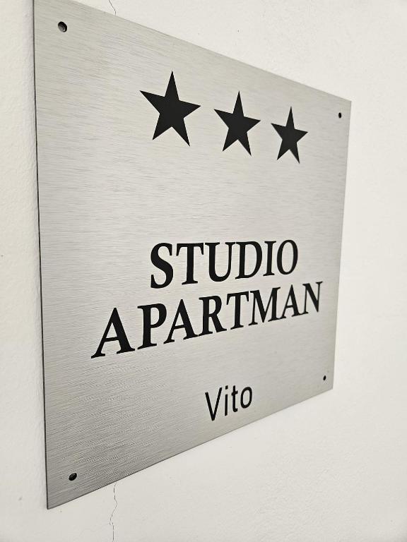 a sign for the instituto aparliamentarianidium istg at Self Check-in Studio apartman Vito in Lipovac