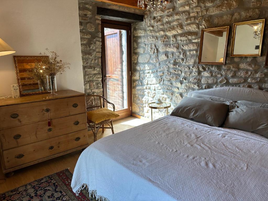 Postel nebo postele na pokoji v ubytování Granaja
