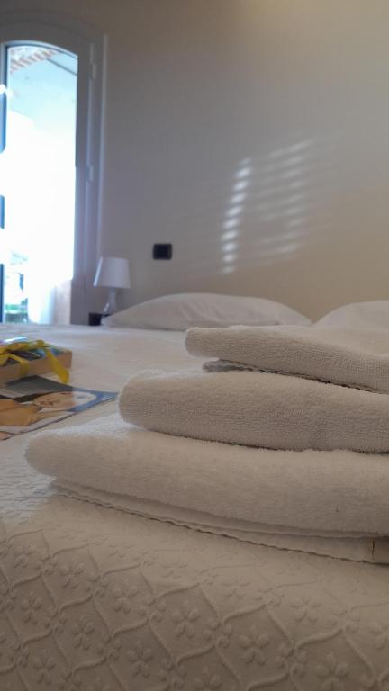 Postel nebo postele na pokoji v ubytování B&B Casa Pascolone