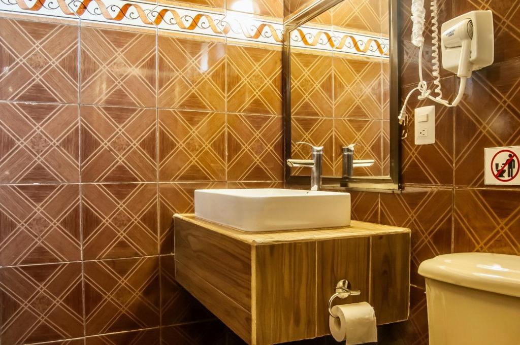 Koupelna v ubytování Hotel Luna Caribe
