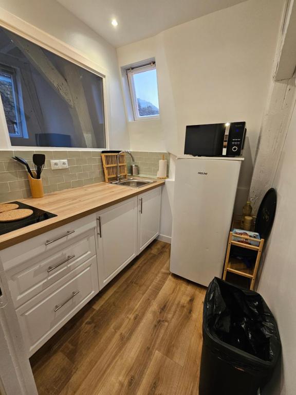 Photo de la galerie de l'établissement Cosy appartement centre-ville, à Brive-la-Gaillarde