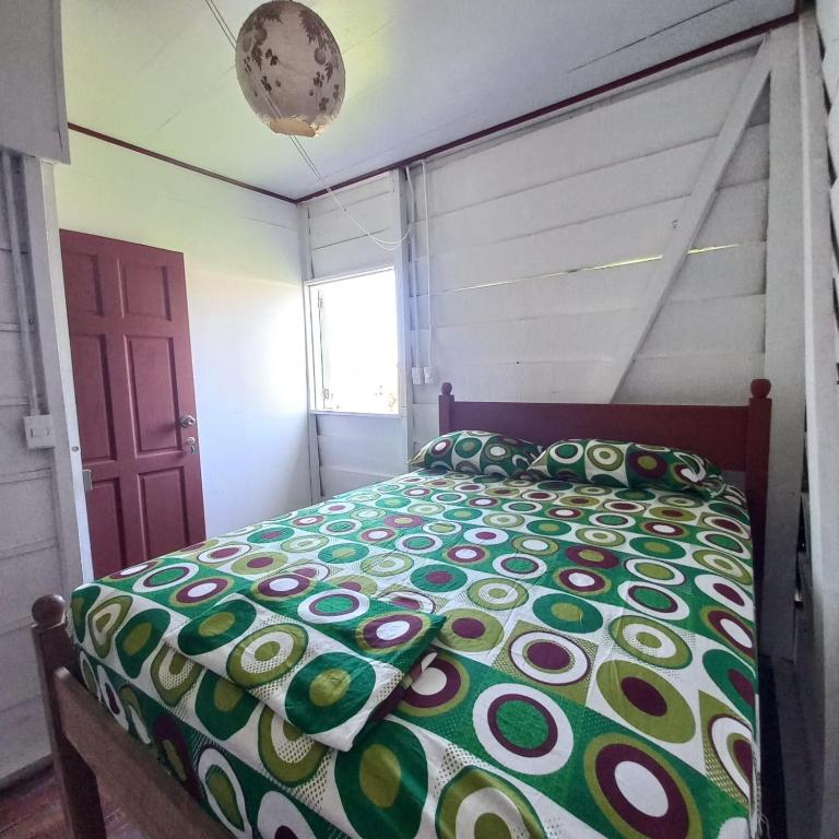 Postel nebo postele na pokoji v ubytování Backpackers Caribe Puerto Viejo