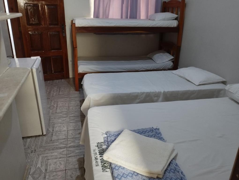 Postel nebo postele na pokoji v ubytování Hotel Algaroba Anexo