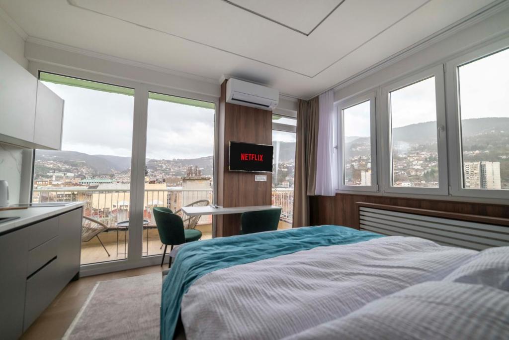 Un pat sau paturi într-o cameră la Lux Apartment Sara - Top Location & Stunning View