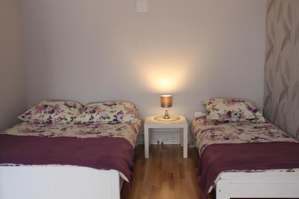 Postel nebo postele na pokoji v ubytování Apartament u Marzenki