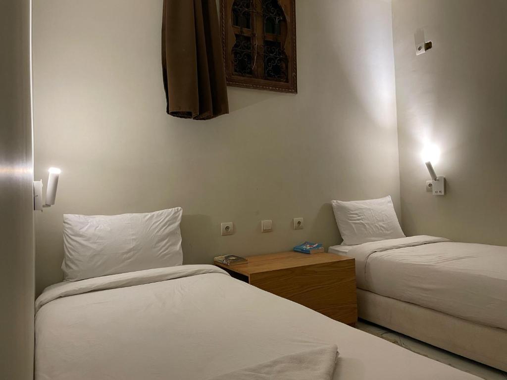 Posteľ alebo postele v izbe v ubytovaní Playa Del Sol Surf House