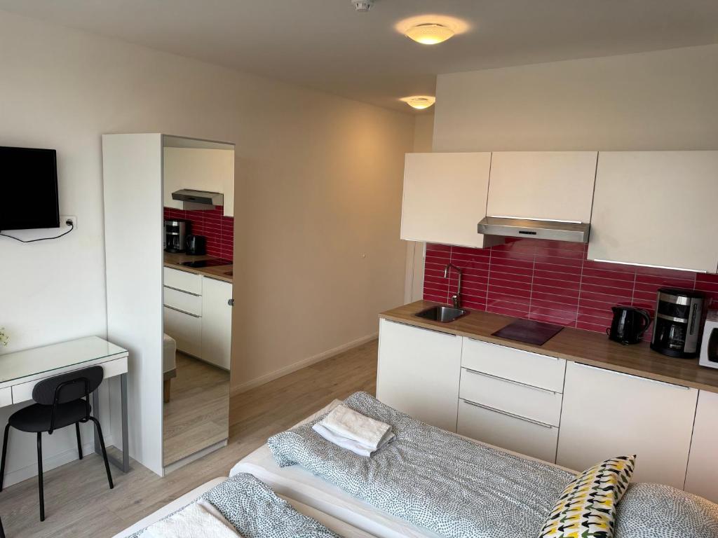 Kuchyň nebo kuchyňský kout v ubytování Ocean Breeze Apartments