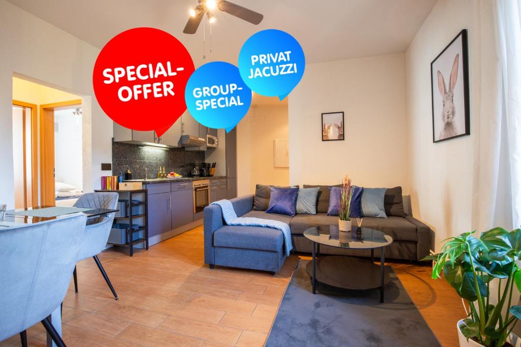 a living room with a couch and a table at Special ROGER F RABBIT 2 Apartment, Roche Towers, 10-STAR in Basel
