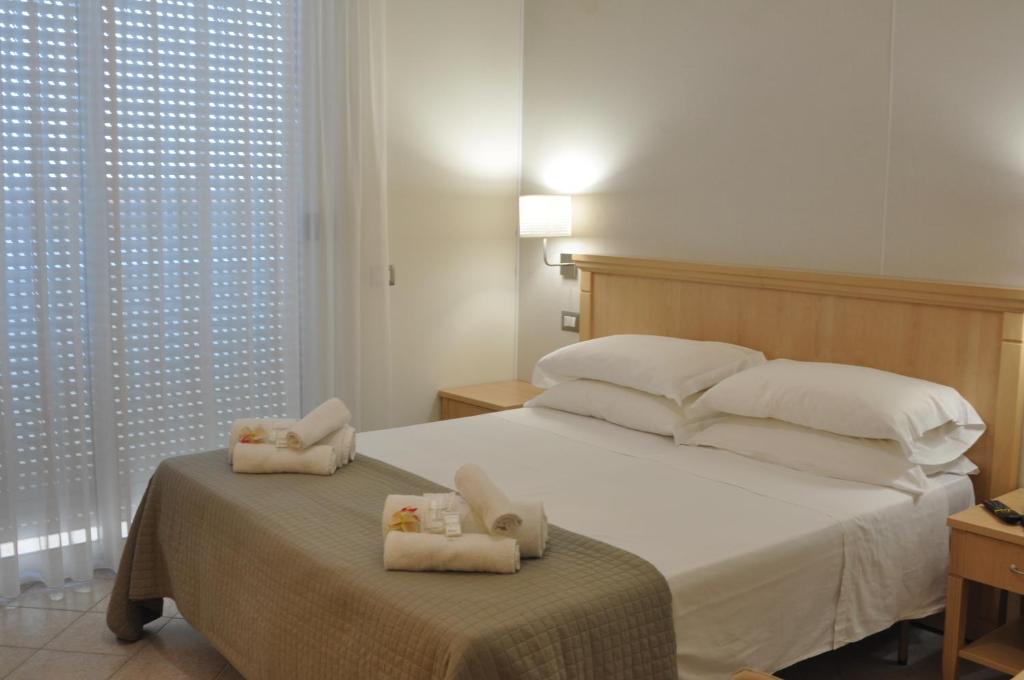 Postel nebo postele na pokoji v ubytování Hotel Adriatic&Beauty