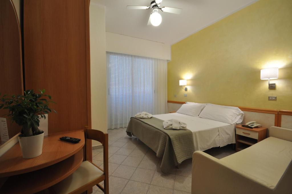Postel nebo postele na pokoji v ubytování Hotel Adriatic&Beauty