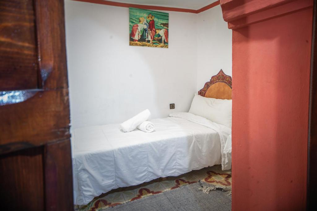 Postel nebo postele na pokoji v ubytování Riad Dar Chourafa