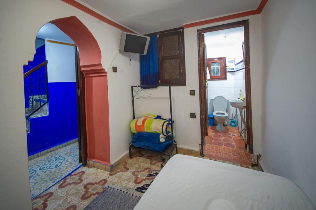 Postel nebo postele na pokoji v ubytování Riad Dar Chourafa
