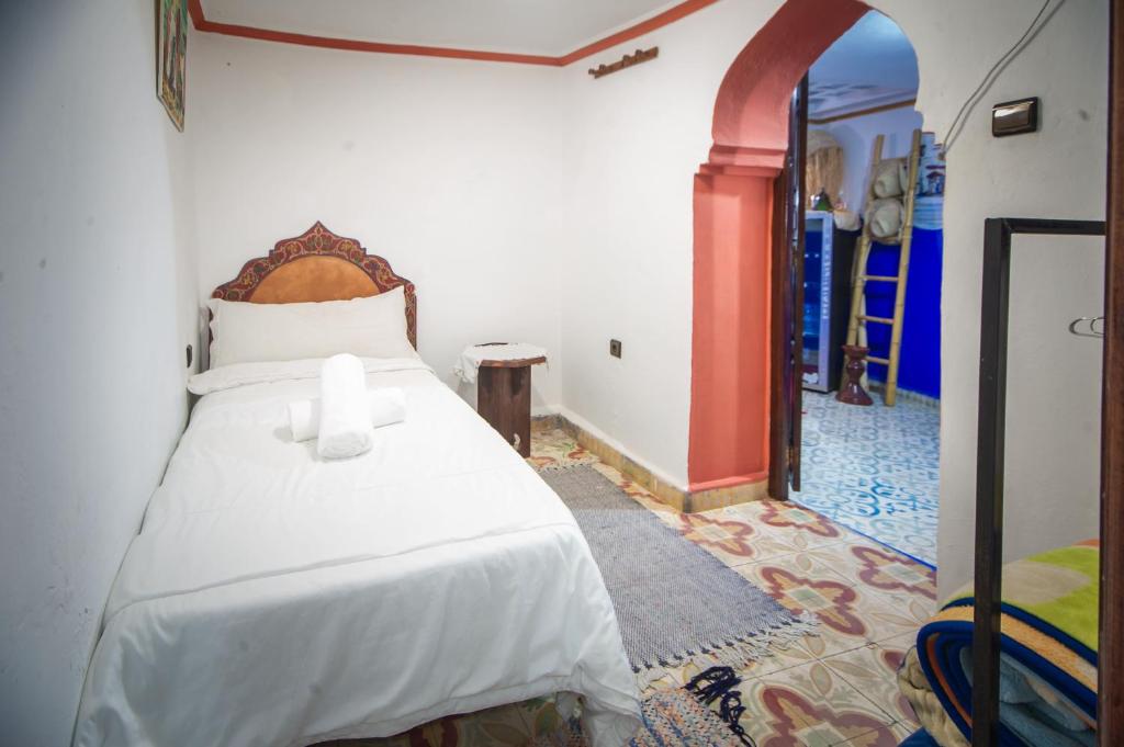 Postel nebo postele na pokoji v ubytování Riad Dar Chourafa