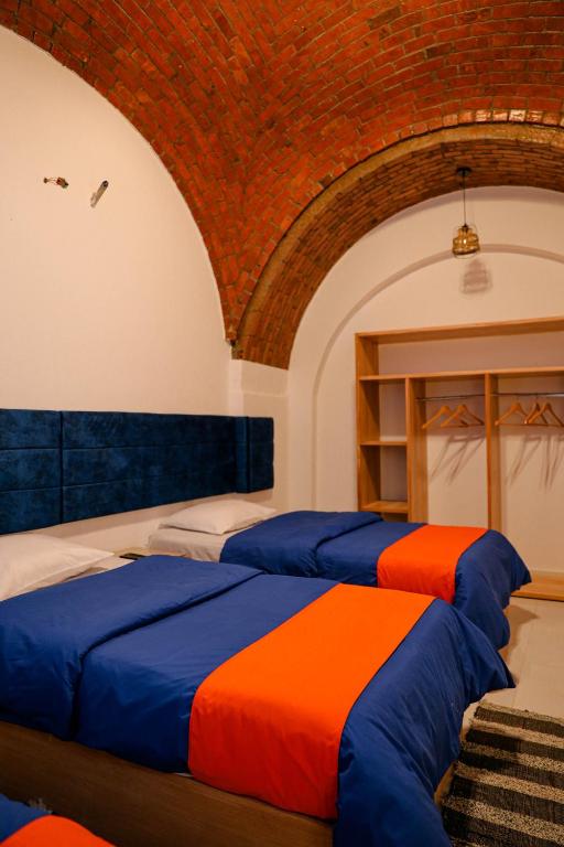 Postel nebo postele na pokoji v ubytování JAREEDY Guest house