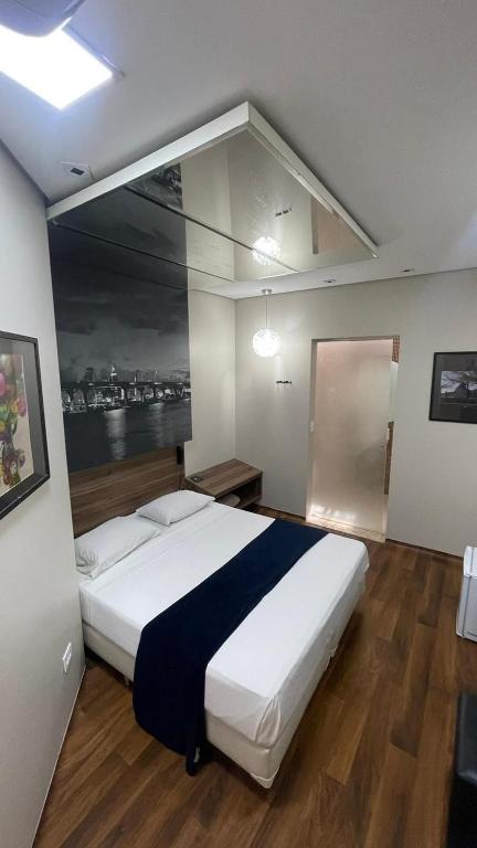 Postel nebo postele na pokoji v ubytování ADD HOTÉIS Center Norte