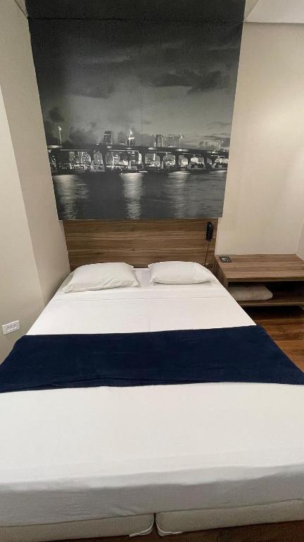 Postel nebo postele na pokoji v ubytování ADD HOTÉIS Center Norte