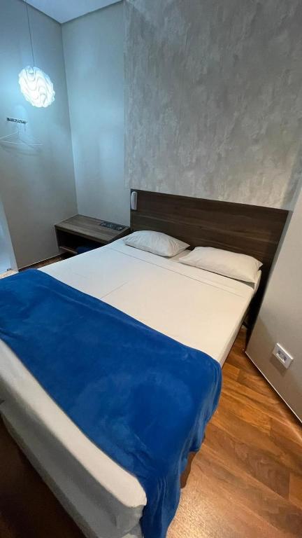Postel nebo postele na pokoji v ubytování ADD HOTÉIS Center Norte