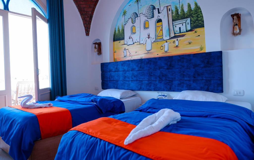 Postel nebo postele na pokoji v ubytování JAREEDY Guest house