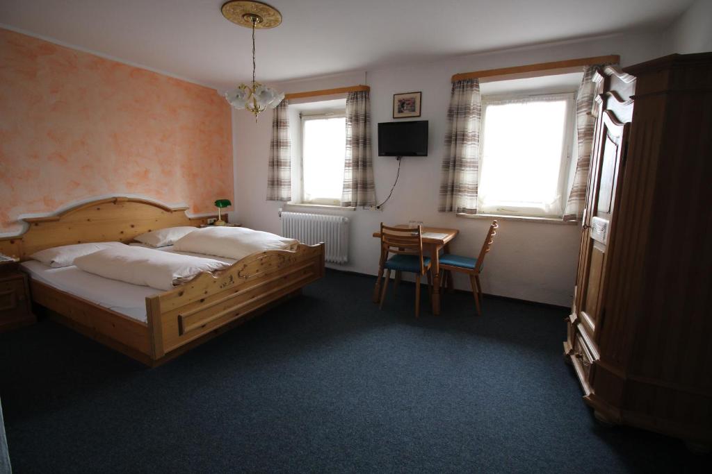 Postel nebo postele na pokoji v ubytování Erlebnislandgasthof Hotel Neiderhell