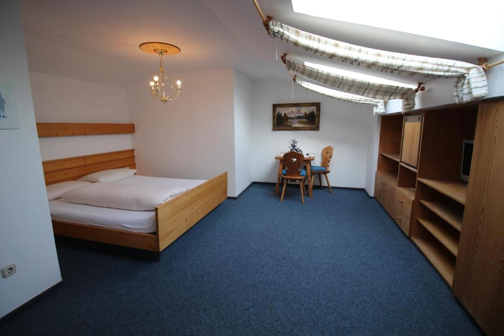 Postel nebo postele na pokoji v ubytování Erlebnislandgasthof Hotel Neiderhell