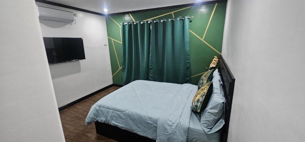 Postel nebo postele na pokoji v ubytování BZ Hostel Cebu