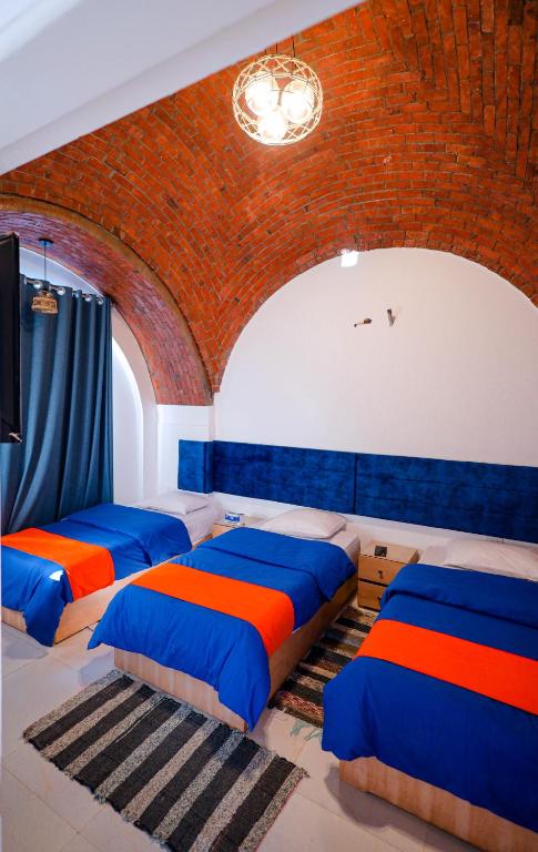 Postel nebo postele na pokoji v ubytování JAREEDY Guest house