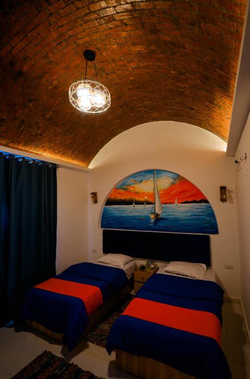 Postel nebo postele na pokoji v ubytování JAREEDY Guest house