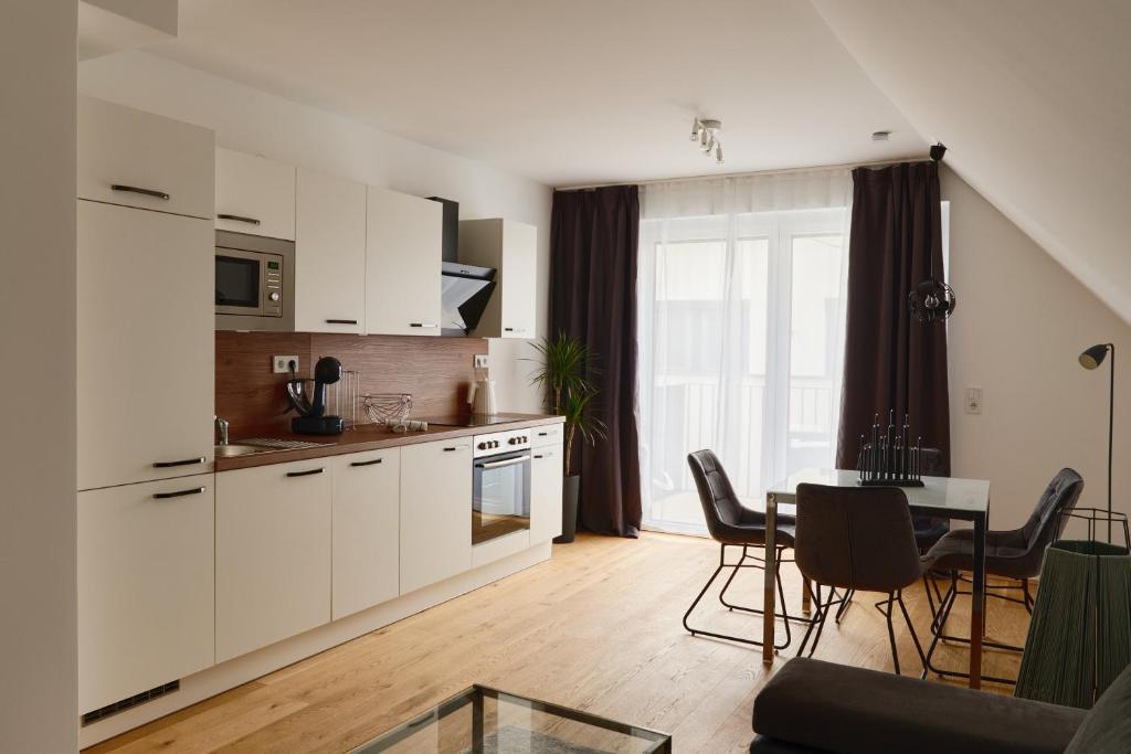Kuchyň nebo kuchyňský kout v ubytování Symphony Apartments Vienna - Garden, Terrace and Grill