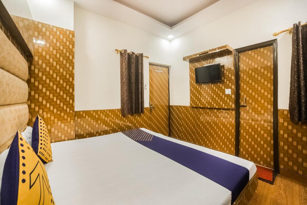 Postel nebo postele na pokoji v ubytování Hotel Silver Palace