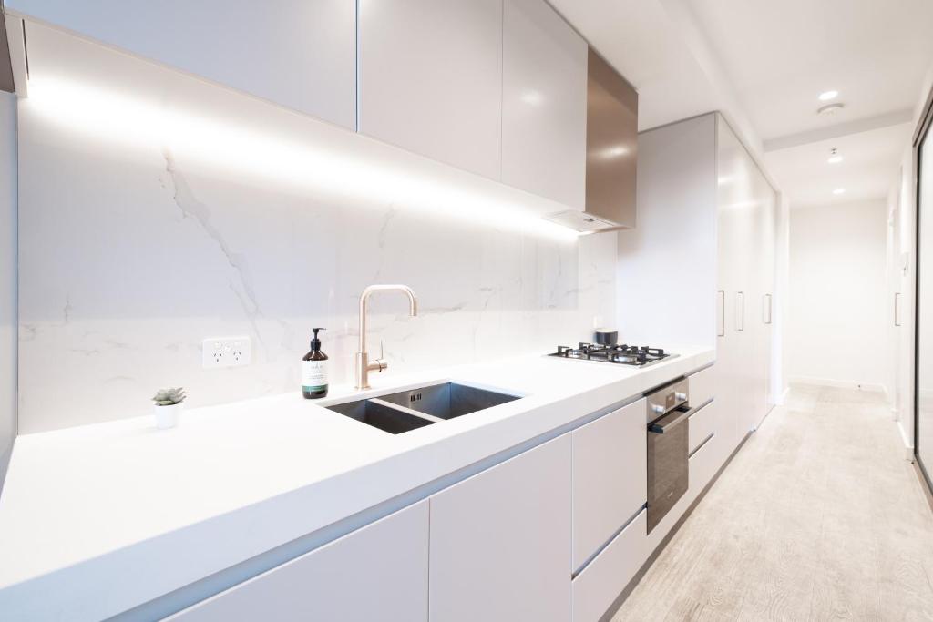 Kuchyň nebo kuchyňský kout v ubytování Heart Melbourne Cbd 1bedroom Apartment Balcony
