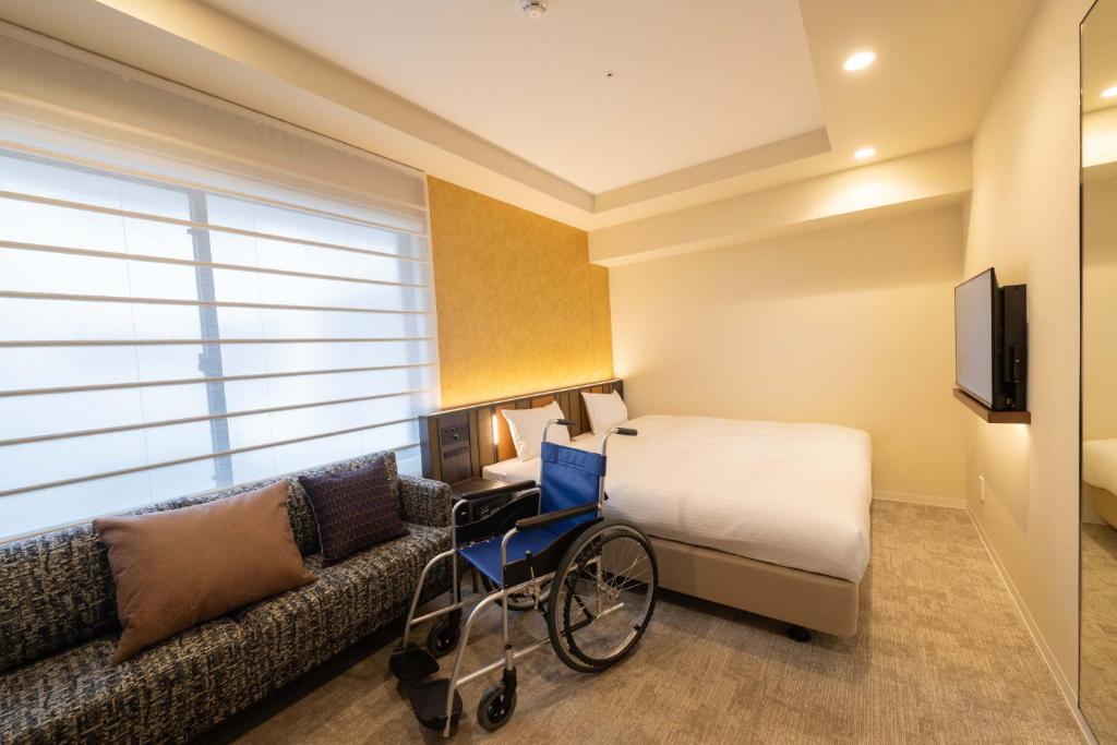 TV a/nebo společenská místnost v ubytování Loisir Hotel Kyoto Toji